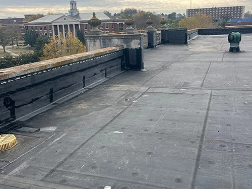 Commercial roof repair and maintenance work in progress